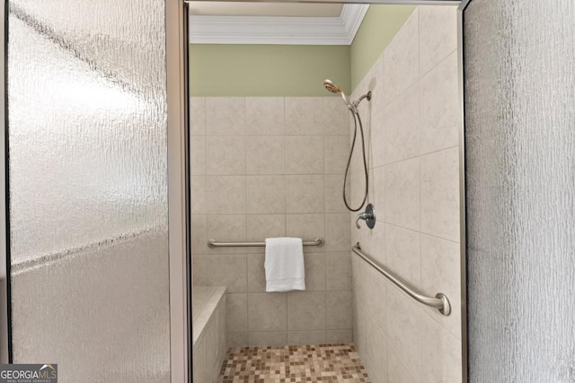 full bathroom with a shower stall and ornamental molding