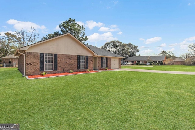 single story home with brick siding, a garage, driveway, and a front yard