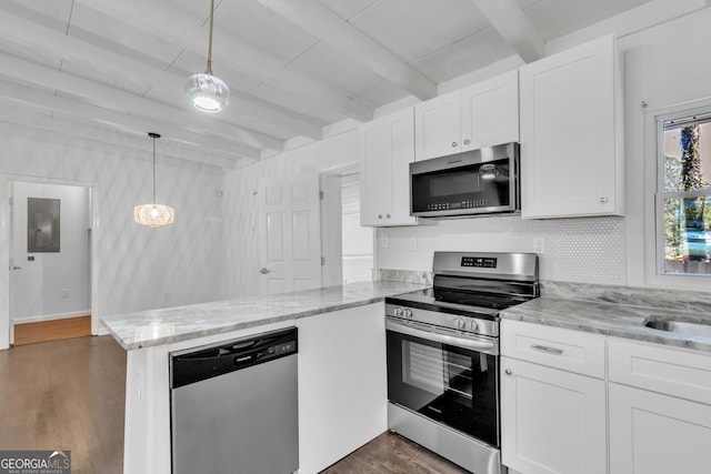 kitchen featuring a peninsula, white cabinetry, appliances with stainless steel finishes, beam ceiling, and dark wood-style floors