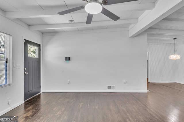 entrance foyer featuring wood finished floors, visible vents, and baseboards