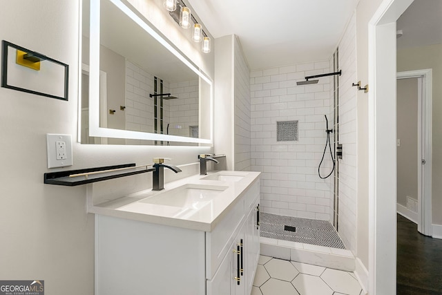 2682 Miriam Ln, Decatur, GA 30032 - bathroom featuring tiled shower, double vanity, and tile patterned floors
