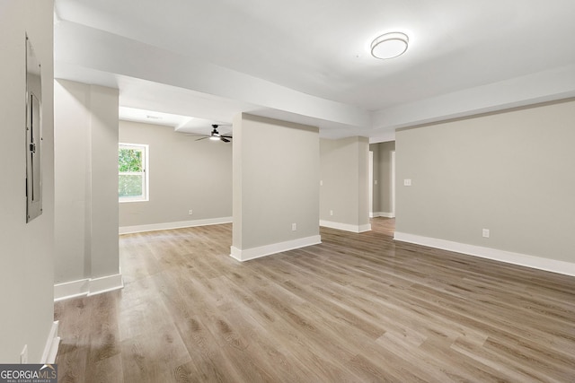 2682 Miriam Ln, Decatur, GA 30032 - spare room featuring light wood-style floors, baseboards, and a ceiling fan