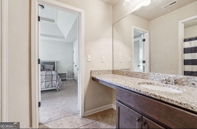 full bath with baseboards, vanity, visible vents, and tile patterned floors