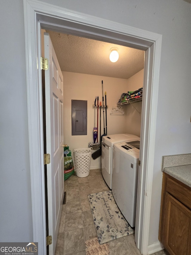 220 Joe Dr, Temple, GA 30179 - washroom with a textured ceiling, washing machine and dryer, laundry area, and electric panel