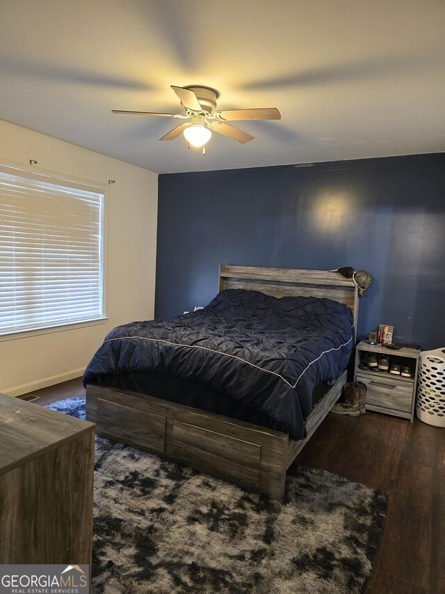220 Joe Dr, Temple, GA 30179 - bedroom featuring baseboards, wood finished floors, and ceiling fan
