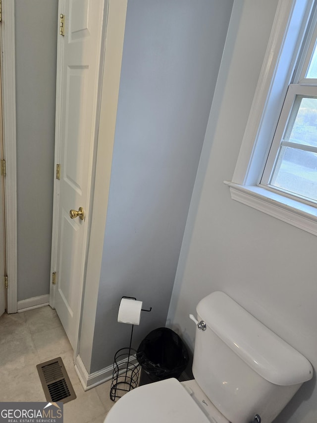 220 Joe Dr, Temple, GA 30179 - bathroom featuring toilet, baseboards, tile patterned flooring, and visible vents