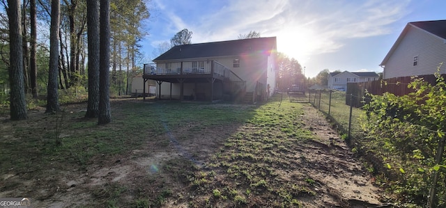 220 Joe Dr, Temple, GA 30179 - back of house with a yard, fence, a deck, and stairs