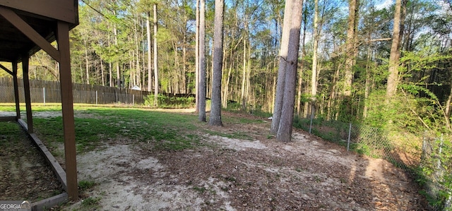 220 Joe Dr, Temple, GA 30179 - view of yard featuring fence and a wooded view