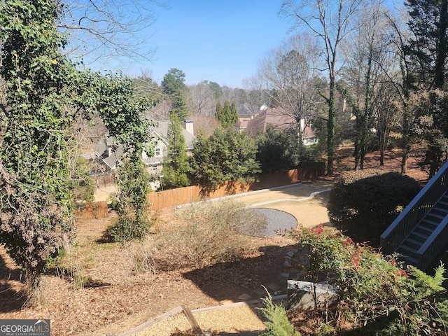 view of yard featuring fence