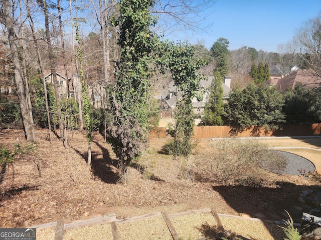 view of yard featuring fence