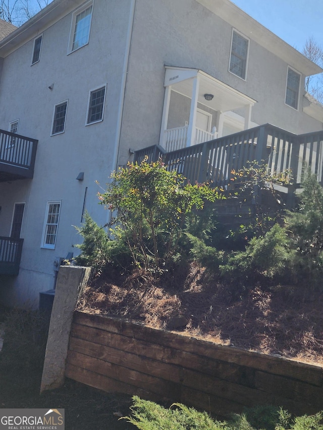 view of home's exterior with stucco siding