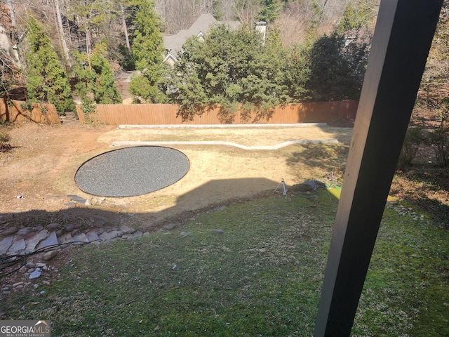 view of yard featuring fence