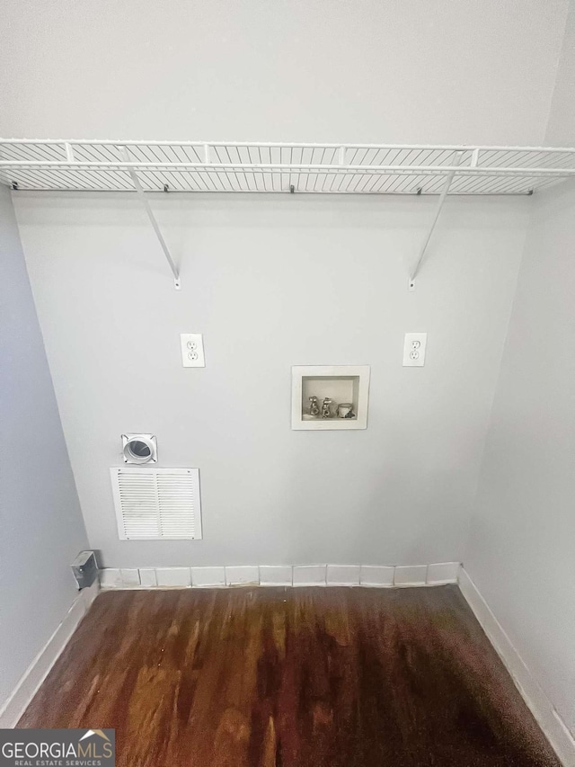 clothes washing area featuring washer hookup, laundry area, visible vents, and electric dryer hookup