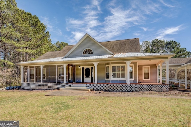 view of front facade with metal roof, a front lawn, and a porch