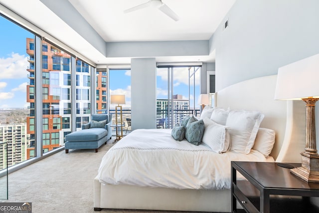 1065 Peachtree St NE Unit 3105, Atlanta, GA 30309 - bedroom with carpet floors, a view of city, access to exterior, and a ceiling fan