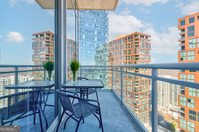 balcony featuring a city view