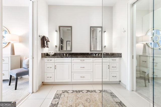 1065 Peachtree St NE Unit 3105, Atlanta, GA 30309 - full bath with tile patterned flooring and double vanity