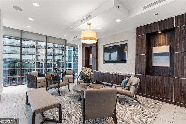 1065 Peachtree St NE Unit 3105, Atlanta, GA 30309 - community lobby featuring expansive windows and recessed lighting