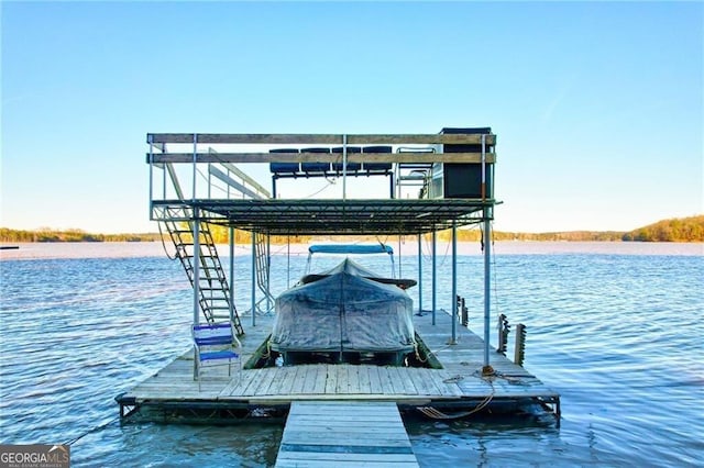 dock area with a water view