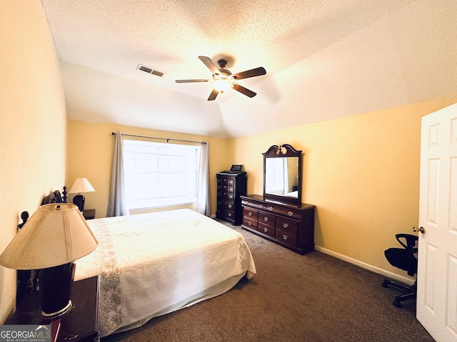 bedroom with baseboards, visible vents, lofted ceiling, a textured ceiling, and carpet floors