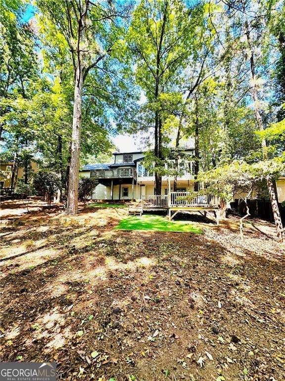 view of yard featuring a deck