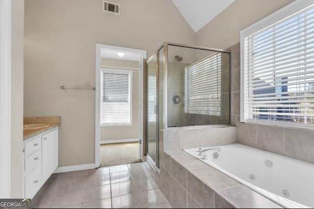 full bath featuring lofted ceiling, visible vents, vanity, and a shower stall