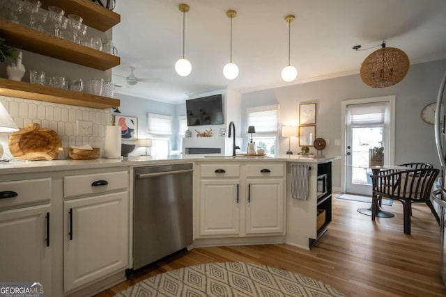 kitchen featuring white cabinetry, open shelves, stainless steel dishwasher, and light countertops