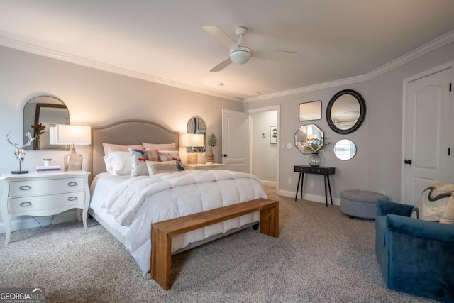 carpeted bedroom with ornamental molding, a ceiling fan, and baseboards