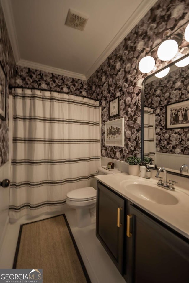 bathroom with ornamental molding, visible vents, toilet, and wallpapered walls