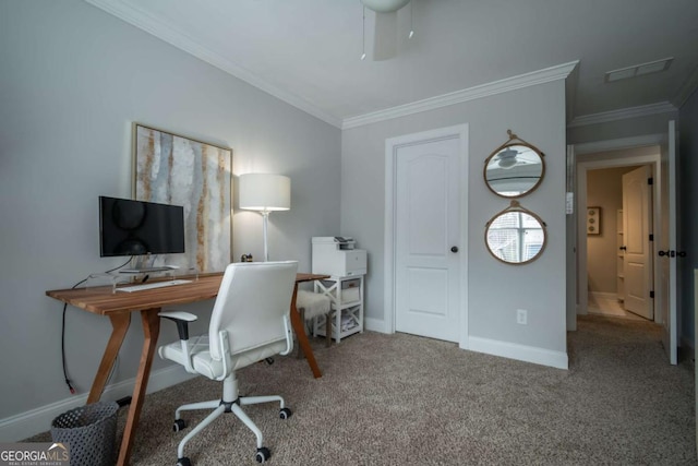 carpeted office space featuring visible vents, baseboards, ceiling fan, and crown molding