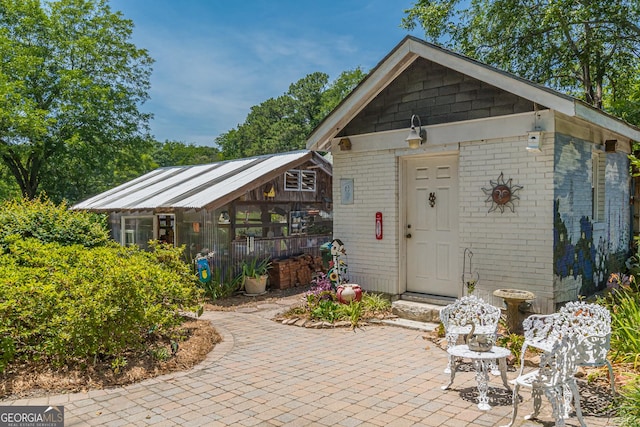 view of outbuilding featuring an outdoor structure