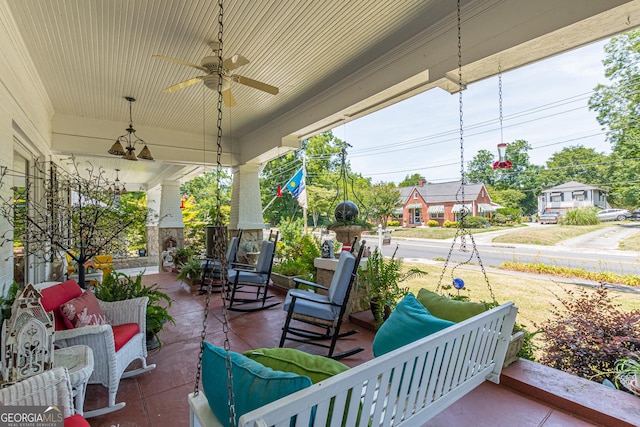 view of patio featuring covered porch and ceiling fan