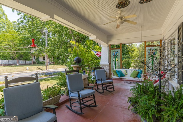 sunroom / solarium with ceiling fan