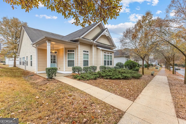 view of front of home with a front yard