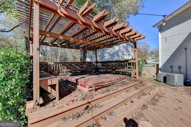 wooden terrace with cooling unit, a gate, and a pergola