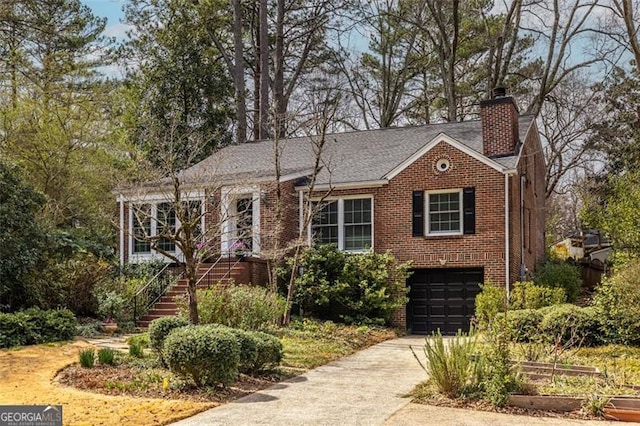 view of front of property featuring brick siding, a chimney, concrete driveway, stairway, and a garage