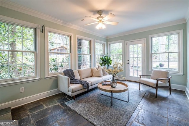 sunroom with a ceiling fan