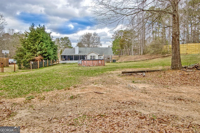 view of yard with fence