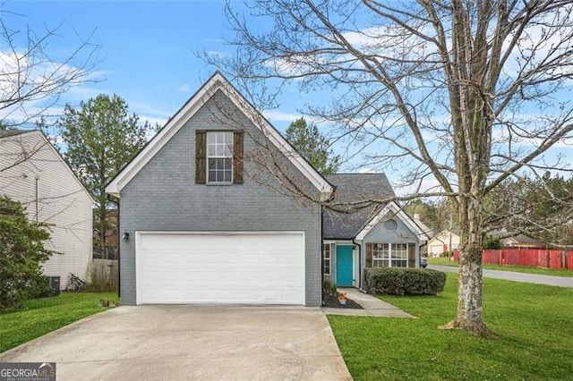 traditional-style home featuring brick siding, driveway, and a front lawn