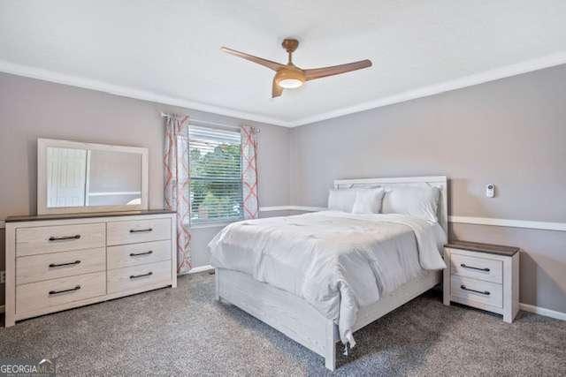 bedroom with crown molding, ceiling fan, and baseboards