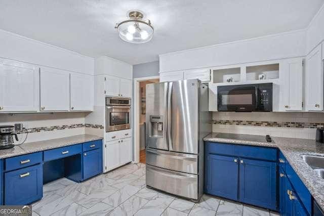 kitchen with white cabinets, marble finish floor, blue cabinetry, black appliances, and tasteful backsplash