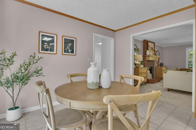 81 Bowers Rd, Moreland, GA 30259 - dining area featuring light tile patterned floors, baseboards, ornamental molding, and a fireplace