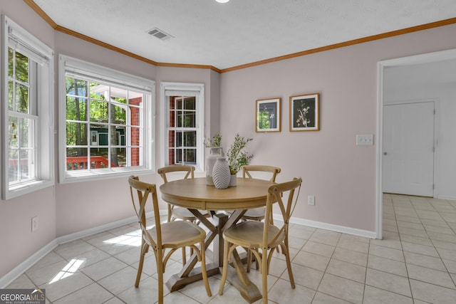 81 Bowers Rd, Moreland, GA 30259 - dining room with plenty of natural light, light tile patterned floors, baseboards, ornamental molding, and a textured ceiling