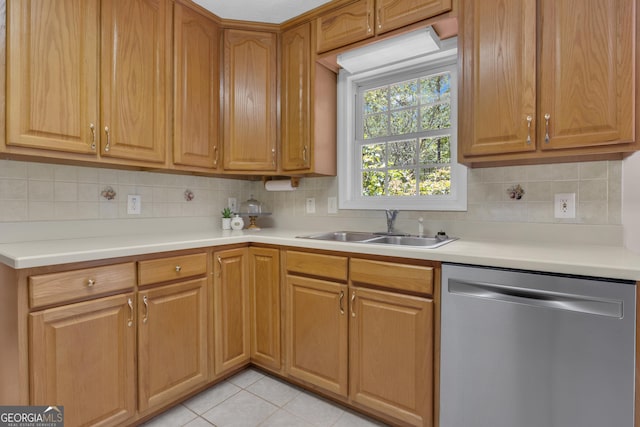 81 Bowers Rd, Moreland, GA 30259 - kitchen with dishwasher, a sink, tasteful backsplash, light countertops, and light tile patterned floors