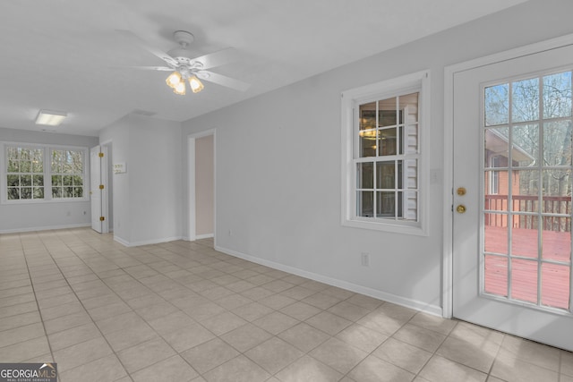 81 Bowers Rd, Moreland, GA 30259 - spare room with plenty of natural light, baseboards, and ceiling fan