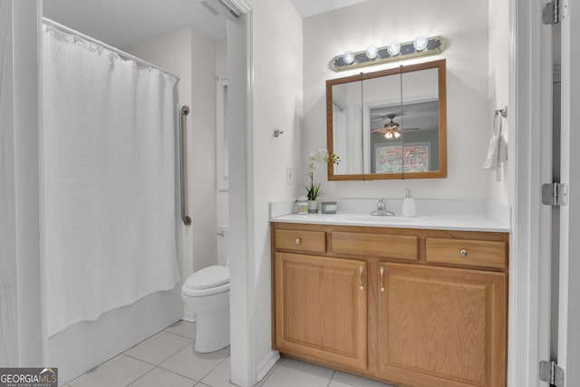 81 Bowers Rd, Moreland, GA 30259 - bathroom with tile patterned floors, vanity, toilet, and a ceiling fan