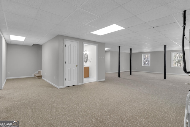 81 Bowers Rd, Moreland, GA 30259 - below grade area with carpet flooring, a drop ceiling, stairs, and baseboards