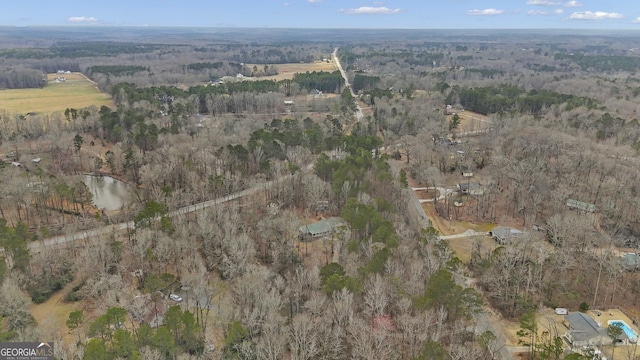 drone / aerial view with a forest view