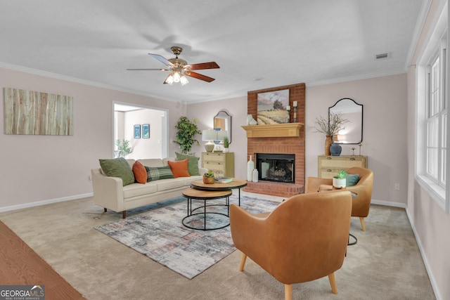 81 Bowers Rd, Moreland, GA 30259 - living area featuring a ceiling fan, a fireplace, baseboards, carpet floors, and crown molding