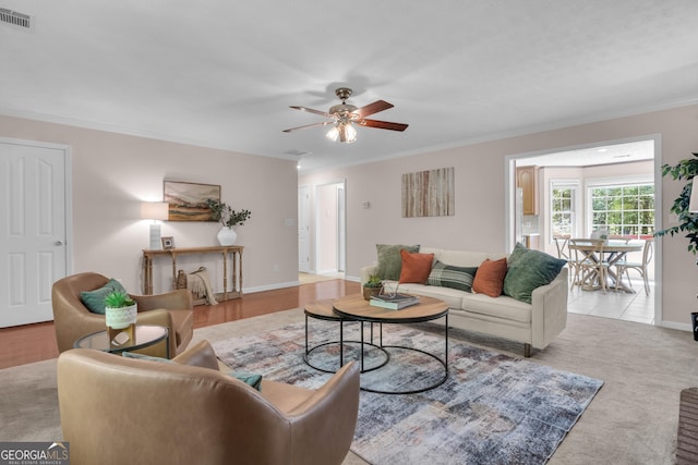 81 Bowers Rd, Moreland, GA 30259 - living area with ceiling fan, crown molding, and baseboards